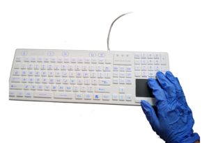 Washable magnetic medical keyboard with track pad for nursing gloves